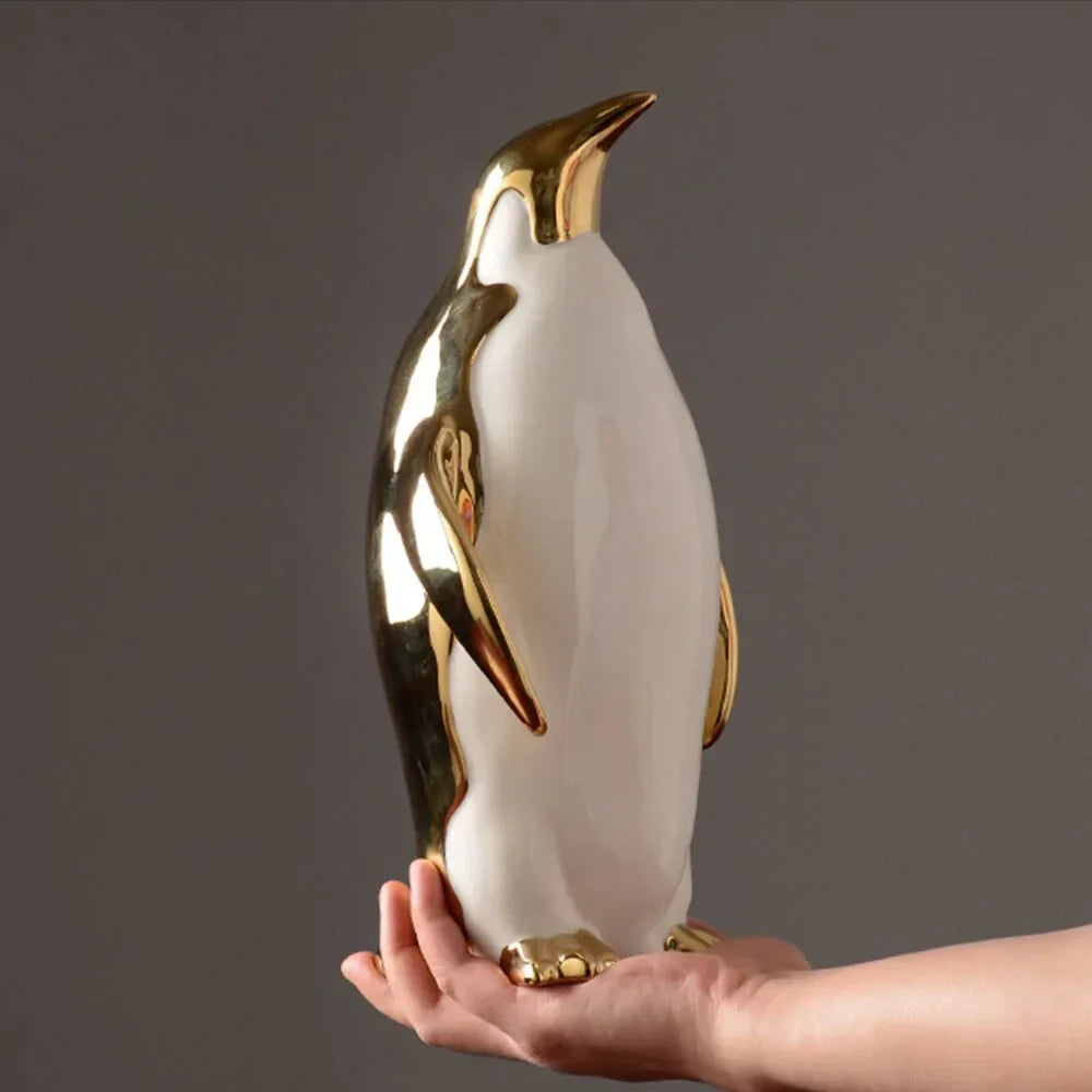 Figuras Decorativas de Pingüinos en Cerámica (Acabado en Oro)